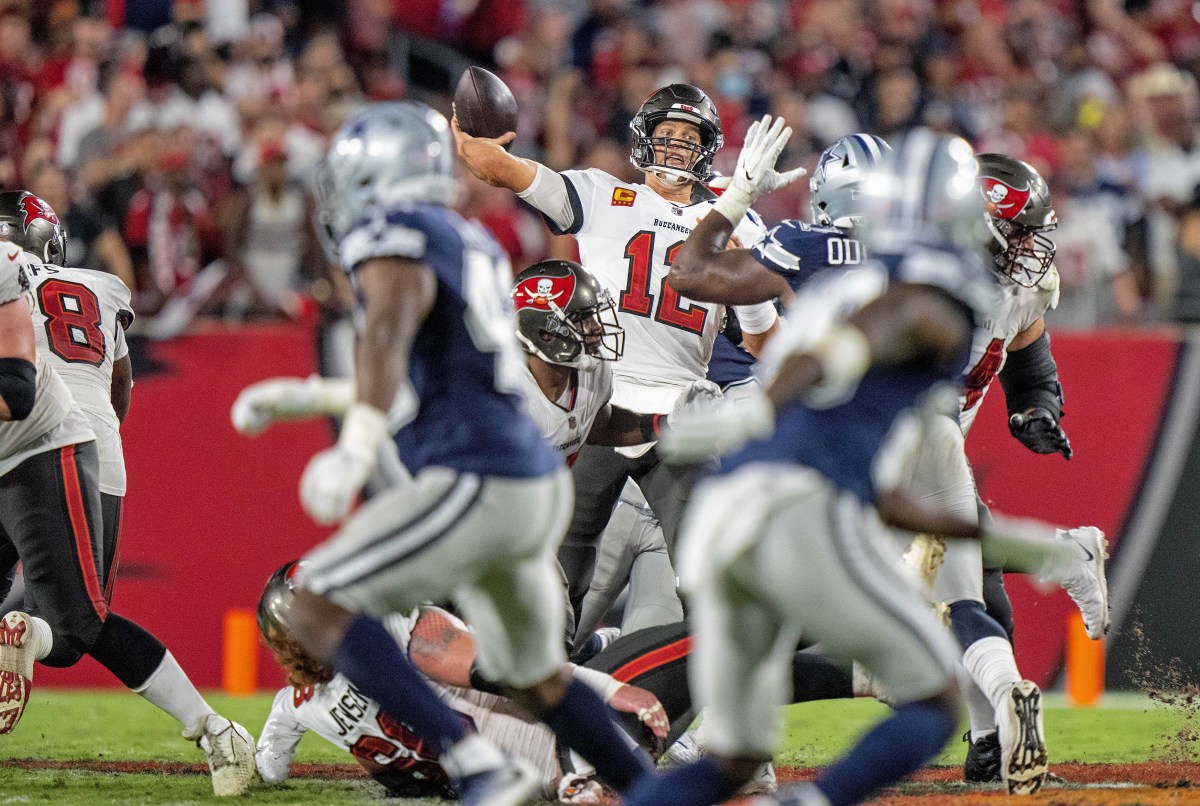 Tom Brady throws a pass against the Cowboys in the 2021 season opener